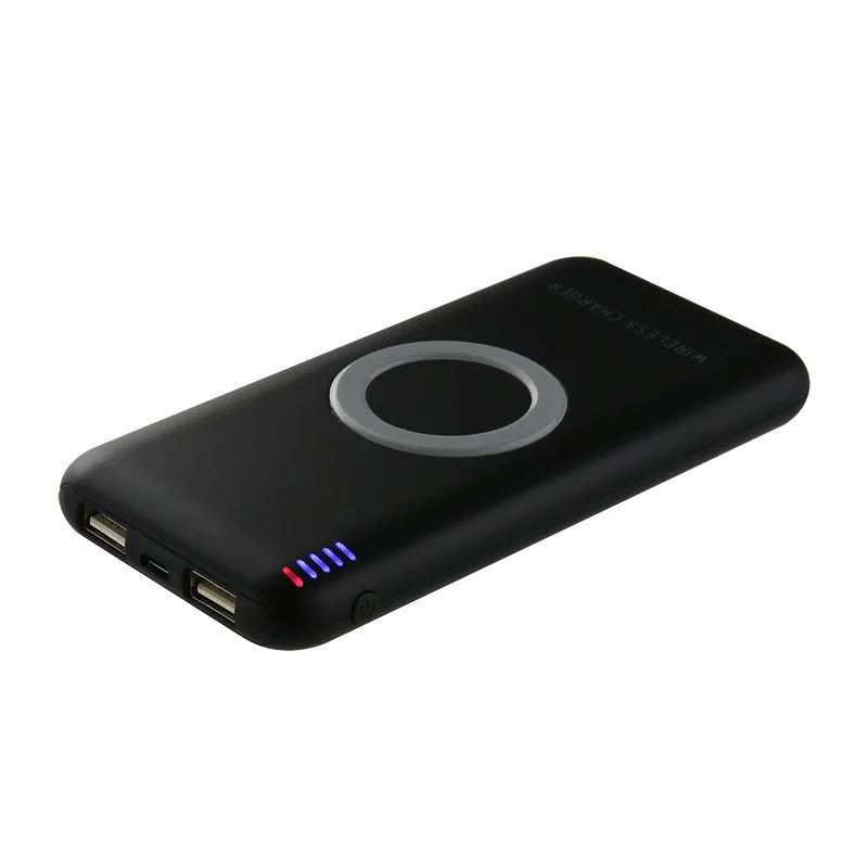 Black B100 wireless charging power bank on a wooden surface, showing USB port and charging indicator.