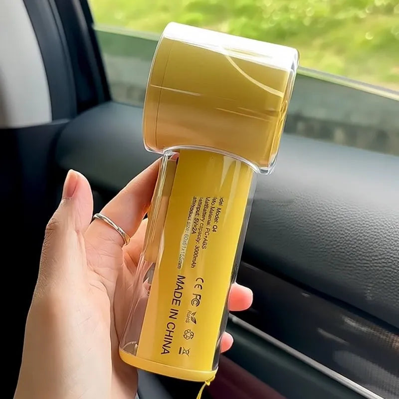 Portable handheld fan with refrigeration function in black, white or yellow, measuring 60x61x155mm