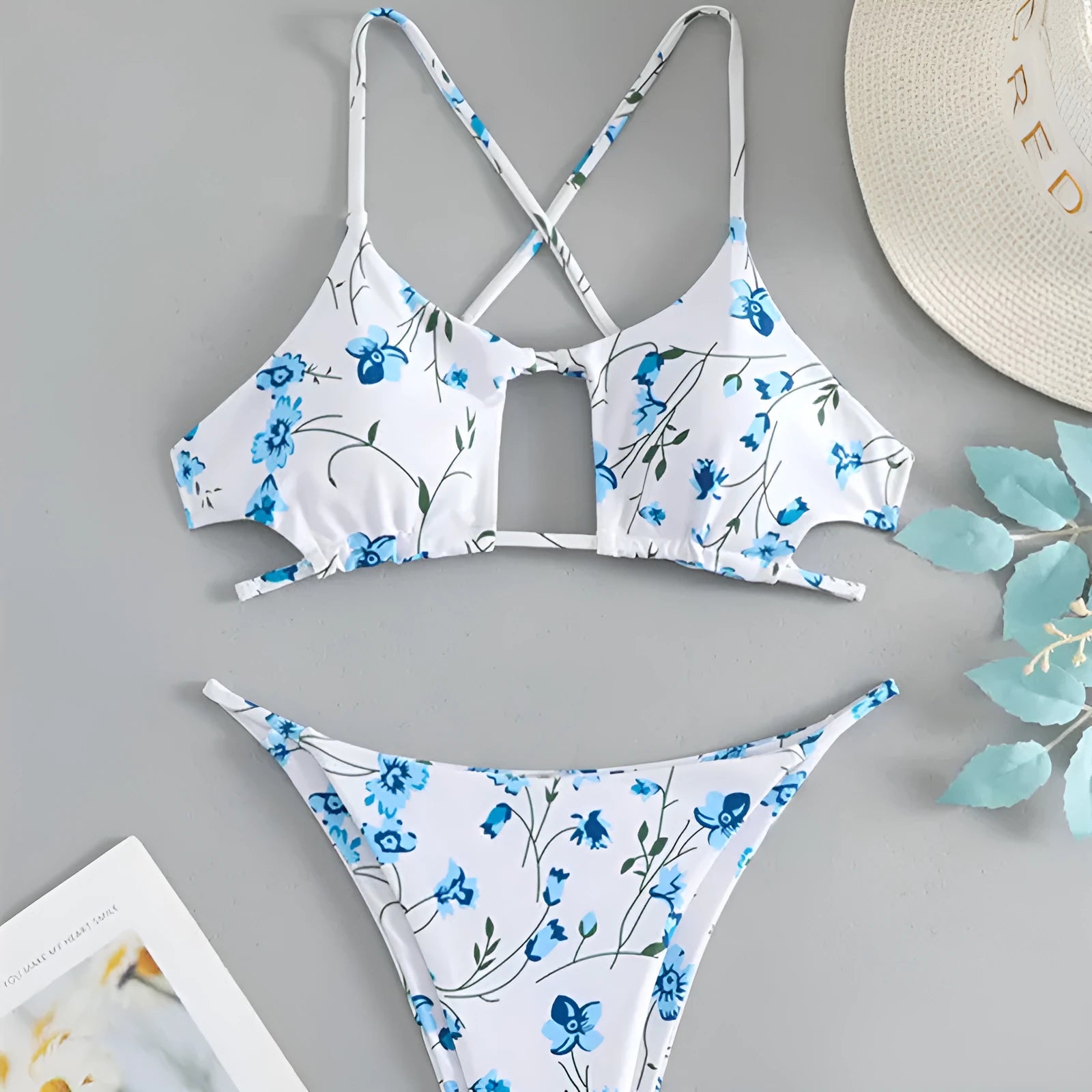 Women's floral patterned tie-neck triangle bikini top with matching shorts swimwear set