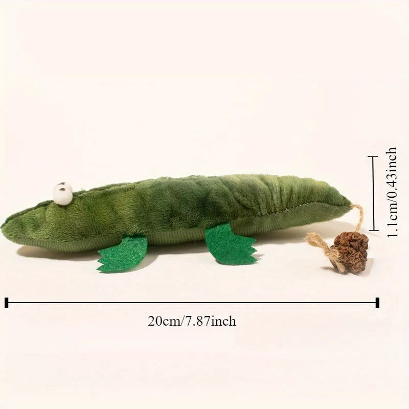 Green plush alligator catnip toy measuring 25cm long with detailed stitching and plant-based materials