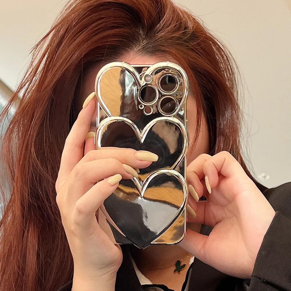 Soft TPU iPhone case with a shiny, three-dimensional electroplated love design on the back.