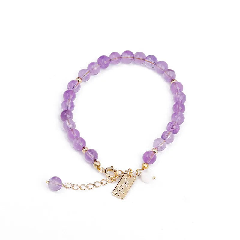 Natural lavender amethyst crystal bracelet with zodiac motifs and adjustable clasp in light or dark colour options