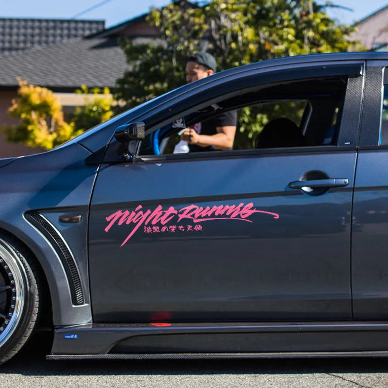 Black Nightwalker car decal sticker with text on a rear windshield, showing 20cm by 7.5cm dimensions.