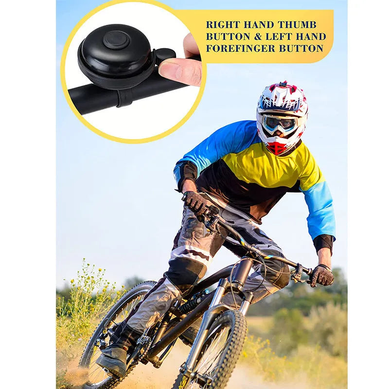 Black ABS plastic bicycle bell with 58mm diameter on a handlebar.