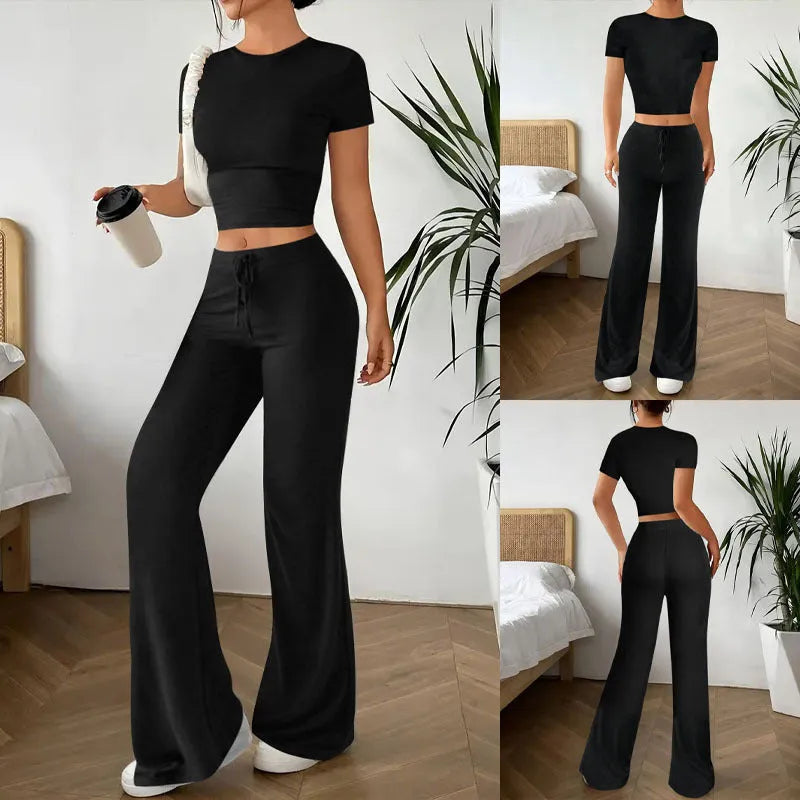 Black high waist trousers and short sleeve t-shirt suit set on a hanger