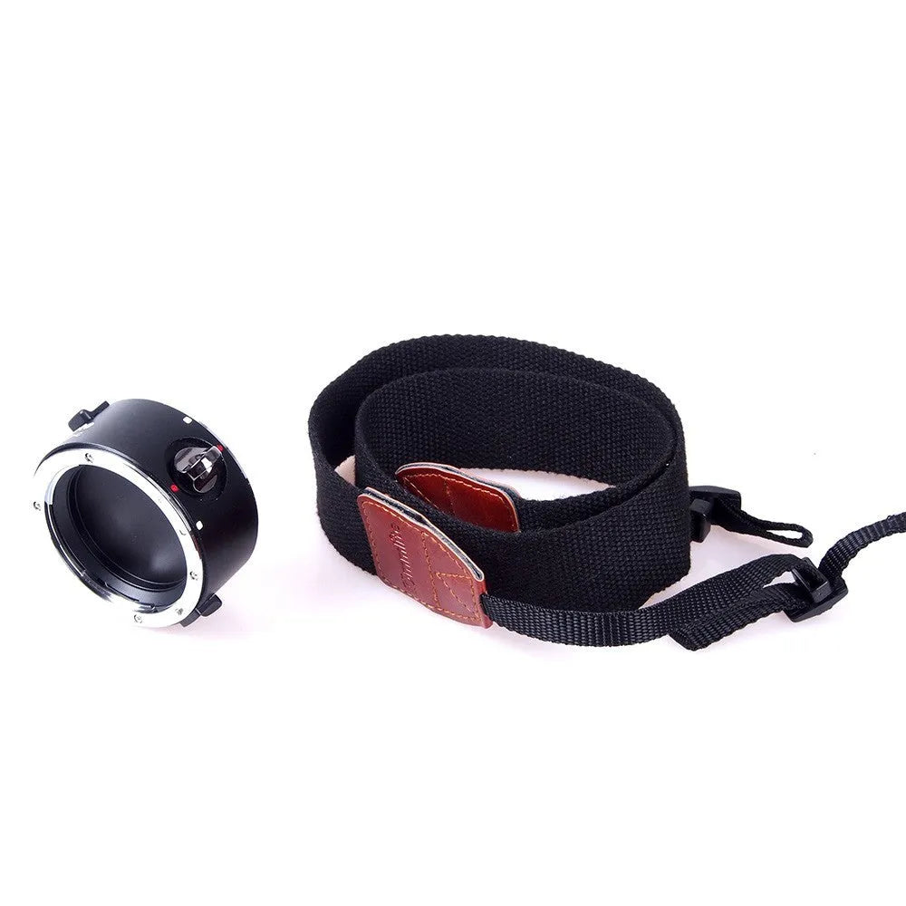 Aluminium alloy Nikon lens flipper holding two camera lenses with cotton shoulder strap