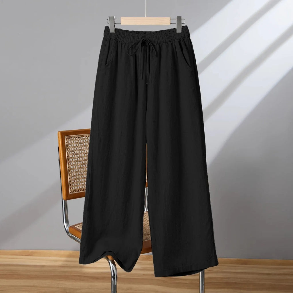 Women's straight-leg casual trousers with elastic waistband and lace-up detail in apricot colour