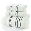A set of one large bath towel and two smaller hand towels in a neutral colour, made from 100% cotton.