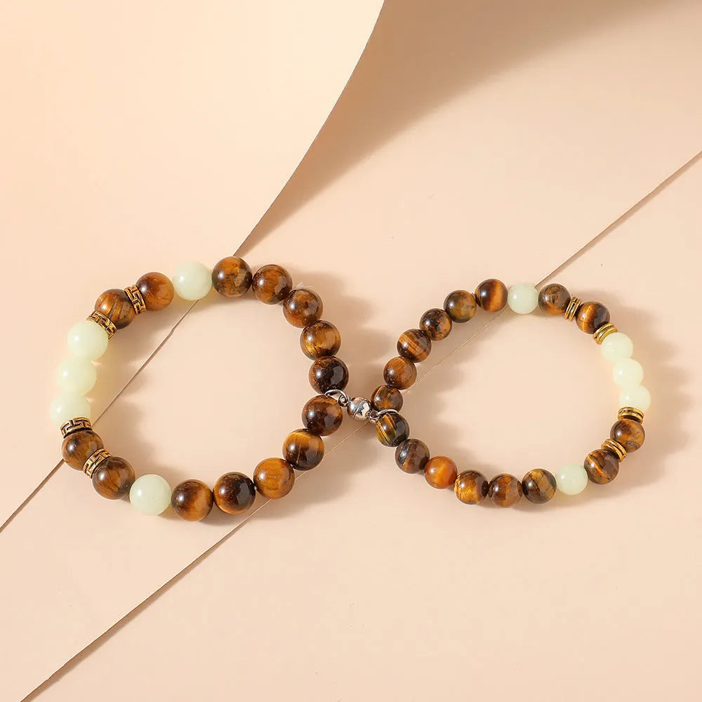Amber geometric couple bracelets with luminous patterns and retro fashion styling