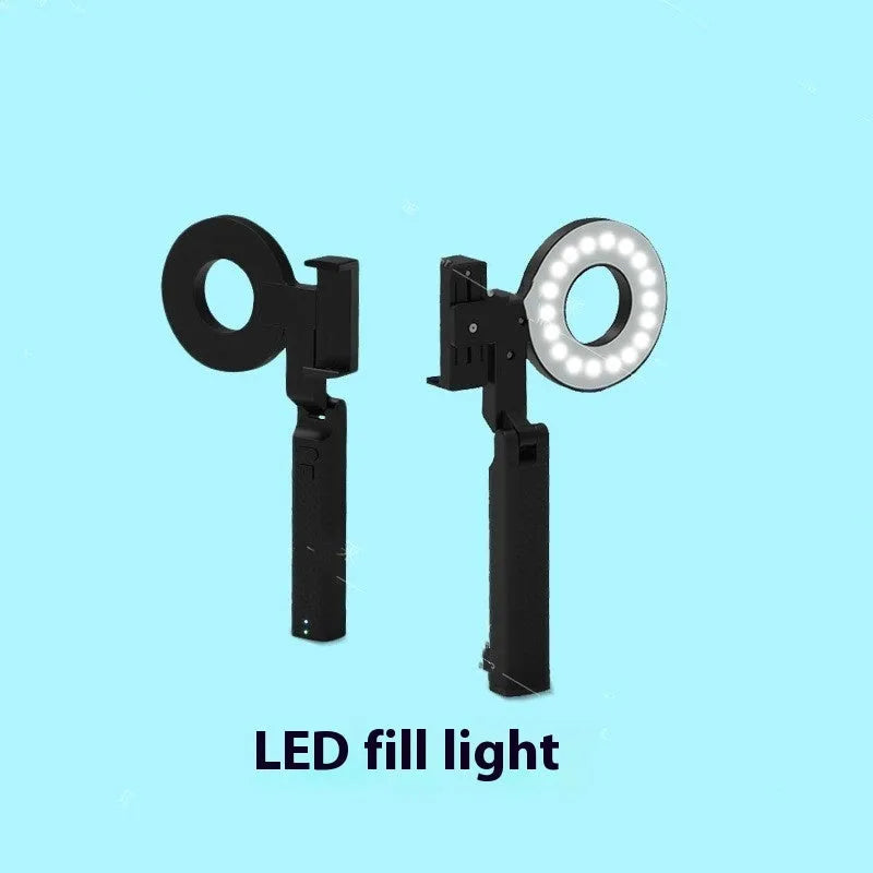 Black handheld LED fill light for smartphone photography with compact rectangular design