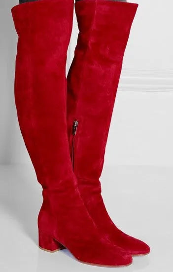 Women's grey suede over-the-knee boots with a pointed toe and low 1-3cm heel on a neutral background.