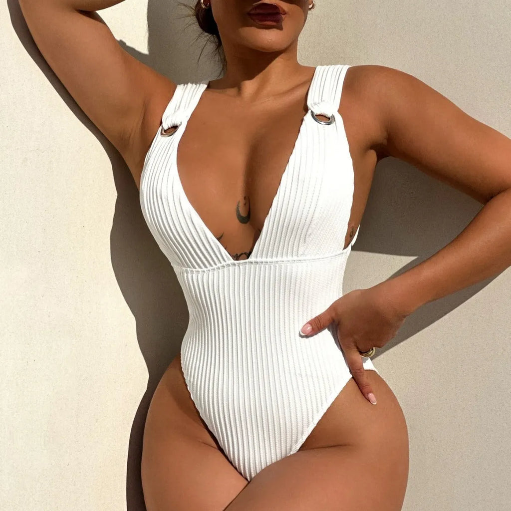 Solid colour one-piece swimsuit for women on a hanger, showing spandex lining and available in black, white, green, orange.