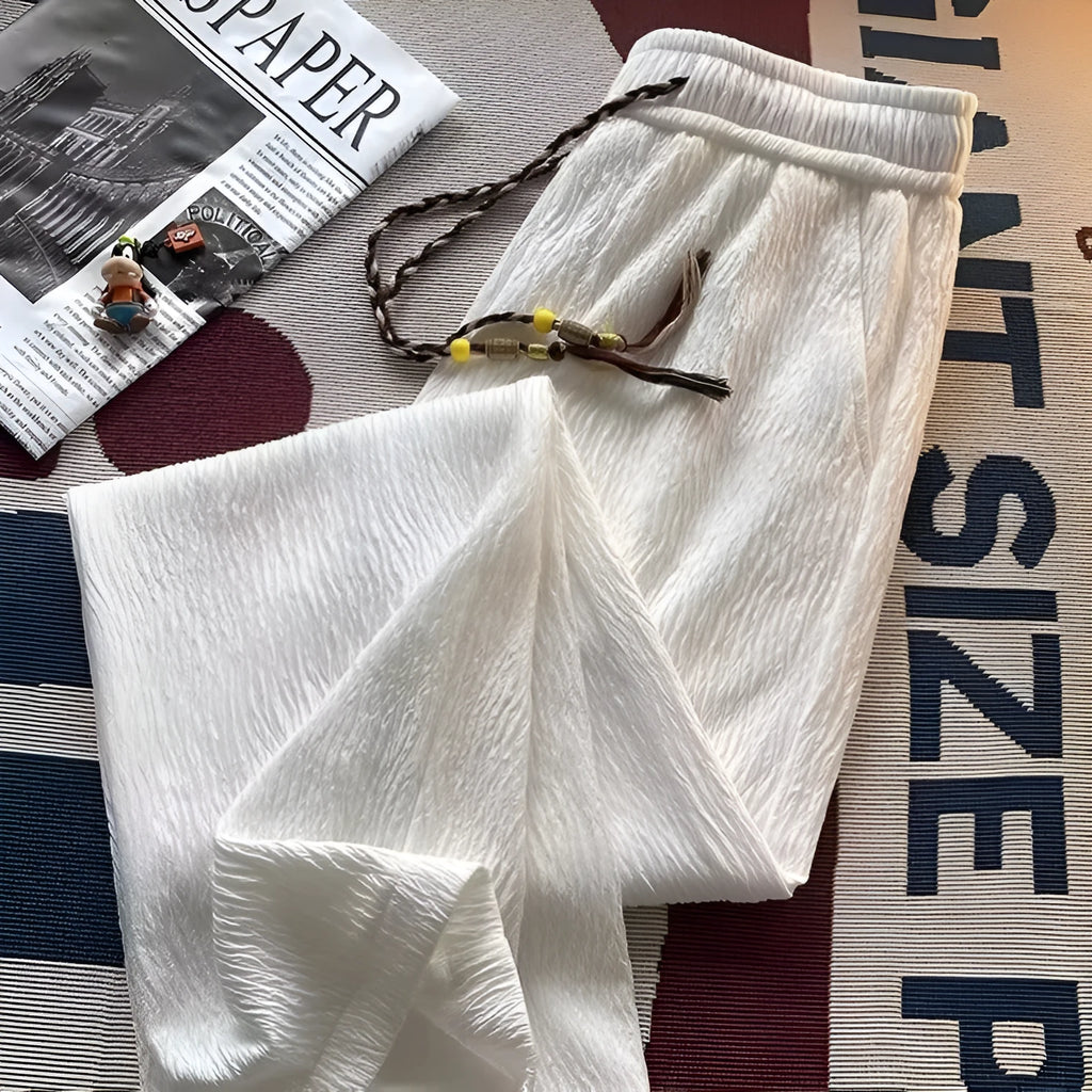 Men's Korean style summer trousers in loose straight-leg fit with drooping texture detail
