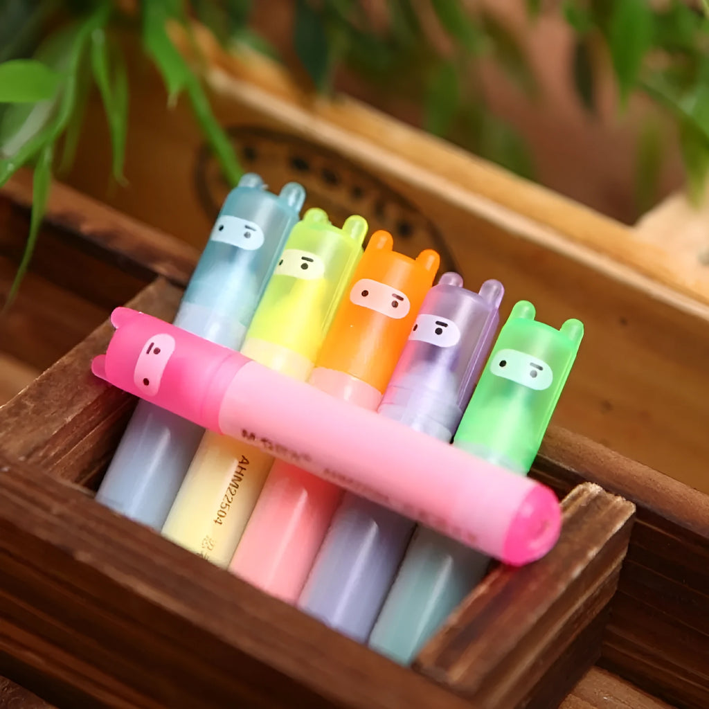 Set of six plastic oblique highlighter pens with assorted fluorescent ink colours