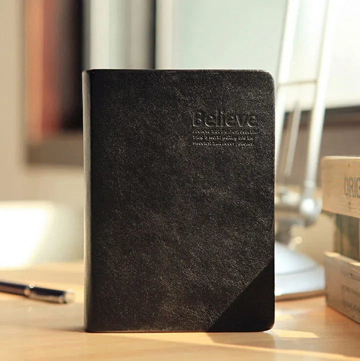 Large thick leather notebook 17 x 12 cm with 480 pages and gold or white cover.