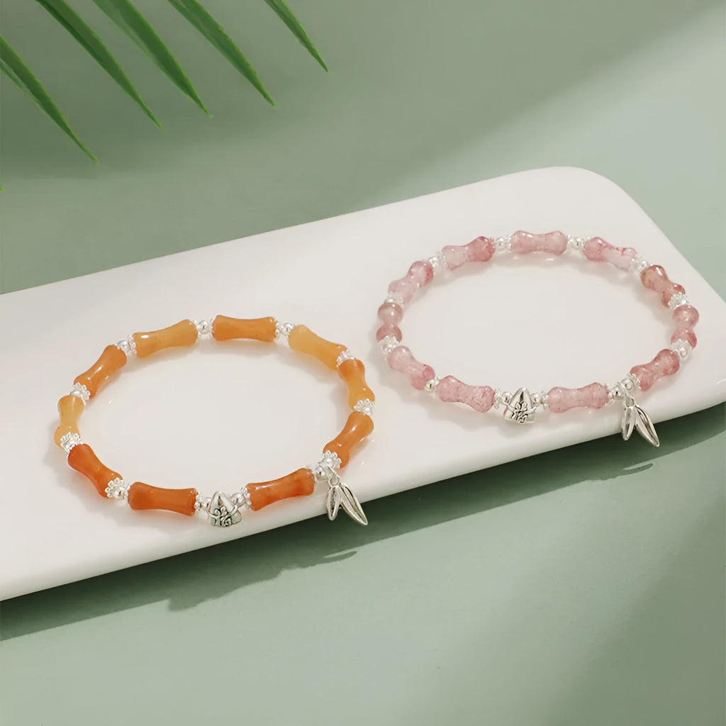 Green Aventurine bamboo crystal bracelet with multiple gemstones including strawberry quartz and olive jade