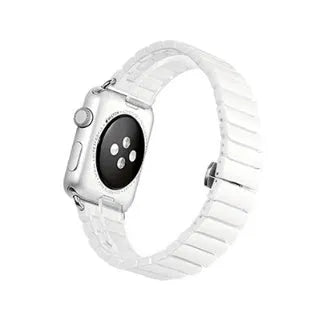 Black ceramic chain link Apple Watch strap with stainless steel clasp on a 42mm watch.