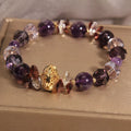 Purple crystal bracelet with pumpkin beads and rhinestone details for women