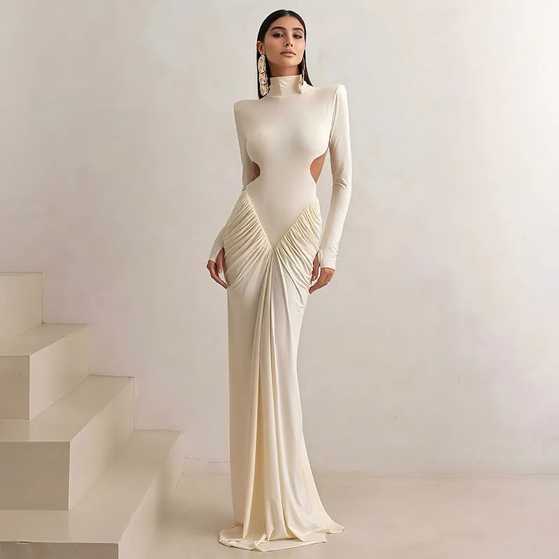 Long sleeve high collar slim fit pleated backless dress in light apricot colour, showcasing private clothing socialite style