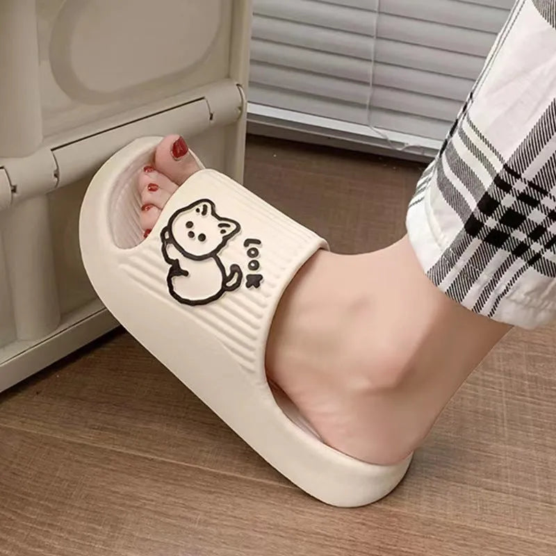 Green cat-themed thick platform sliders with a non-slip EVA sole on a white background.