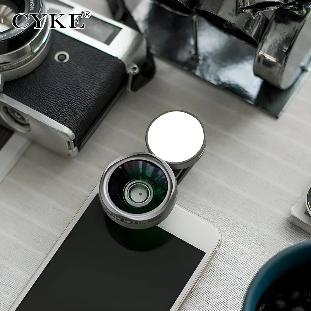 Universal smartphone camera lens kit with wide-angle macro lens and LED ring light in black, red, and silver grey