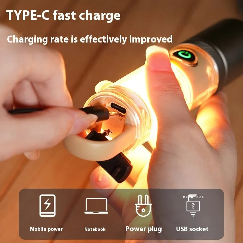 Orange or beige flashlight with dual light source, hook, and keychain, measuring 15cm in length