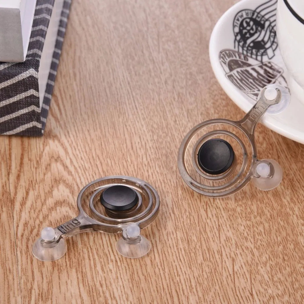 Pair of clear plastic mini joysticks for mobile phone gaming with coloured accents