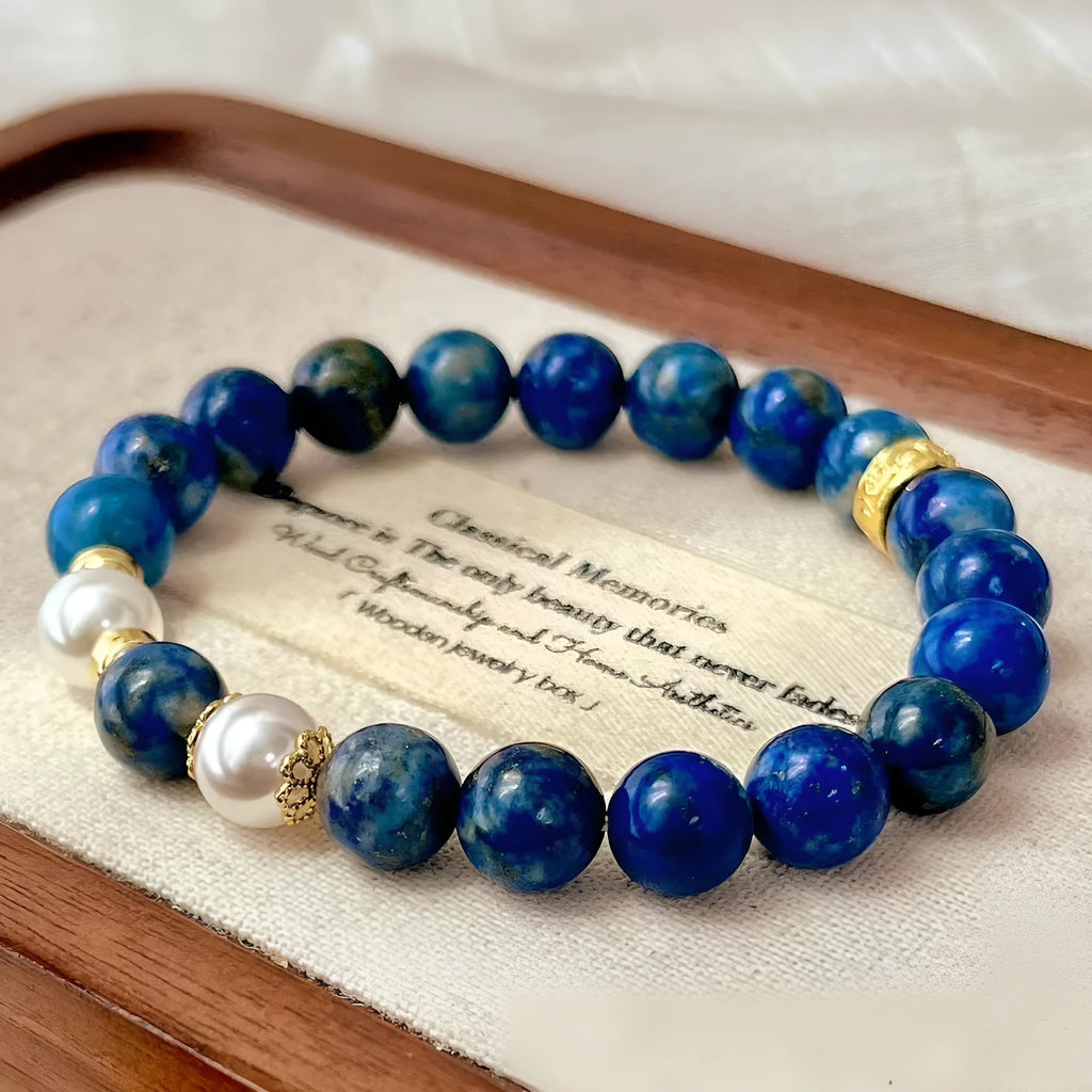 Chinese style artistic retro bracelet made with genuine blue and gold lapis lazuli beads.