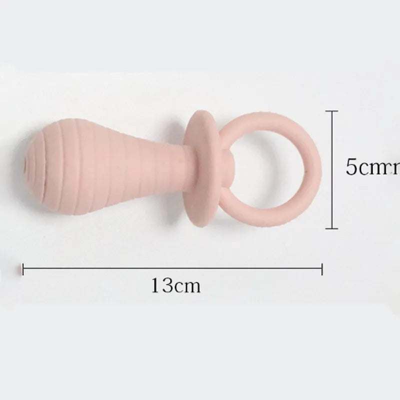A green TPR rubber pet pacifier chew toy with a squeaker for puppies and kittens.