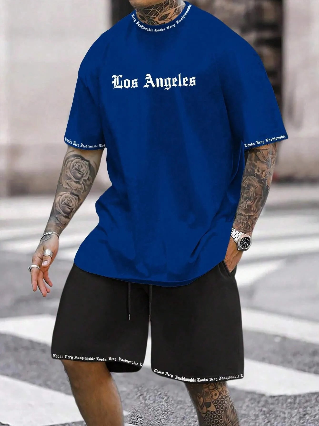 Sports style short-sleeved top and shorts set in polyester blend fabric, available in multiple colours and sizes