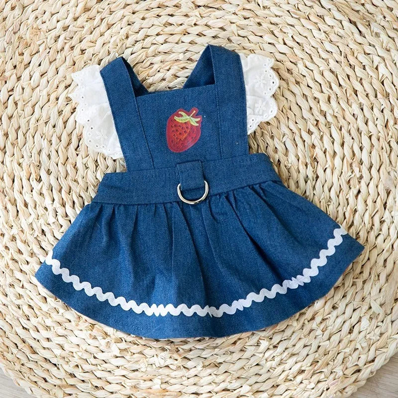 Bondi blue denim skirt for dogs with a strawberry print, shown on a small dog.