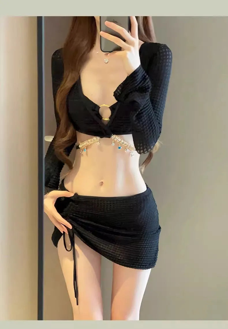 Women's long sleeve black bikini swimsuit with two-piece design for swimming