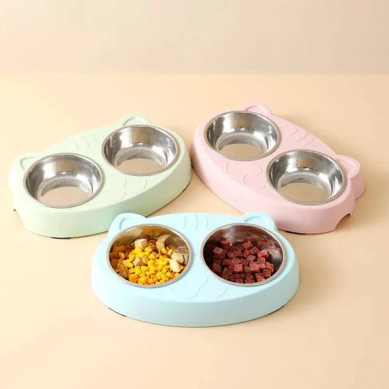Blue plastic pet feeder with two bowls measuring 26.5cm by 17cm for food and water