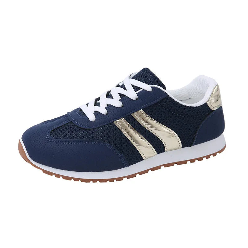 Blue women's lace-up casual sports shoes with cross straps and a flat rubber sole.