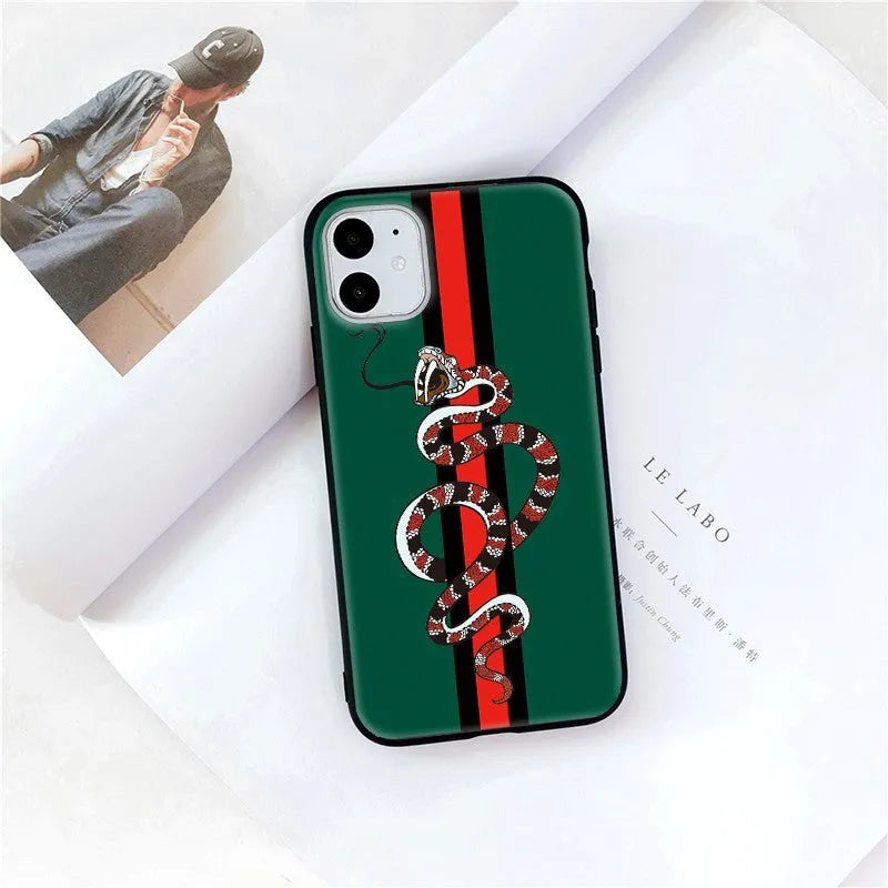 Soft silicone iPhone case with frosted surface showing detailed snake cartoon pattern in black colour