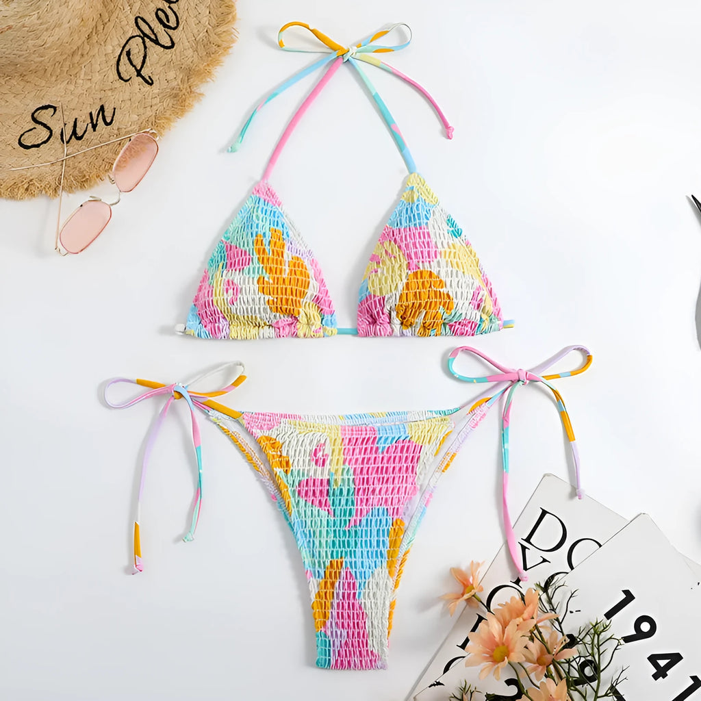Women's multicolour floral triangle bikini with smocking detail on the top and briefs bottom.