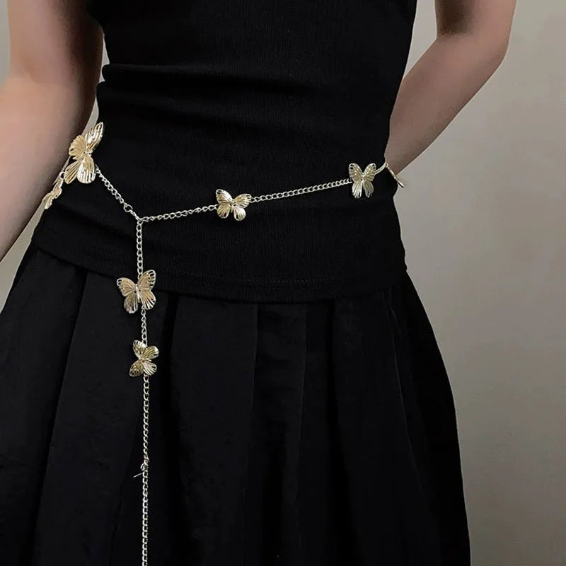 Golden butterfly waist chain with adjustable clasp, 104cm length, on a model showing retro style.