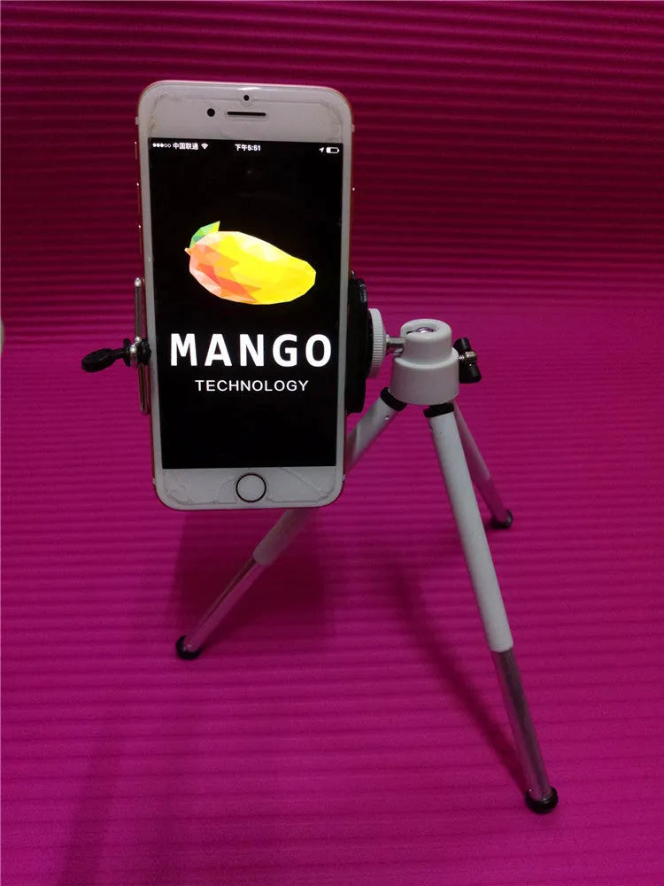 Black desktop phone holder with adjustable two-section bracket on weighted base holding smartphone