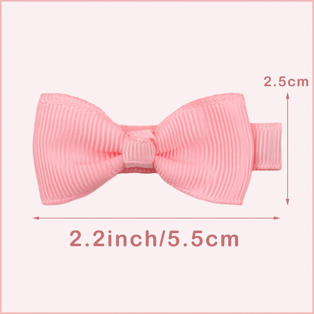 Assortment of pastel-coloured fully lined hair clips and bows for babies and toddlers.