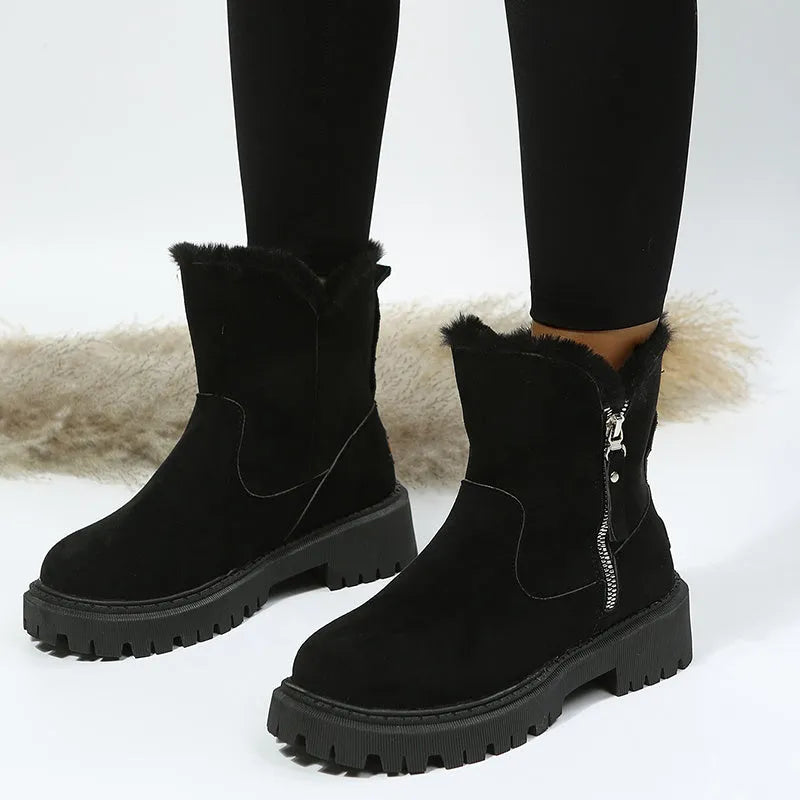 Women's black snow boots with high-top design, side zipper, and non-slip rubber sole for winter
