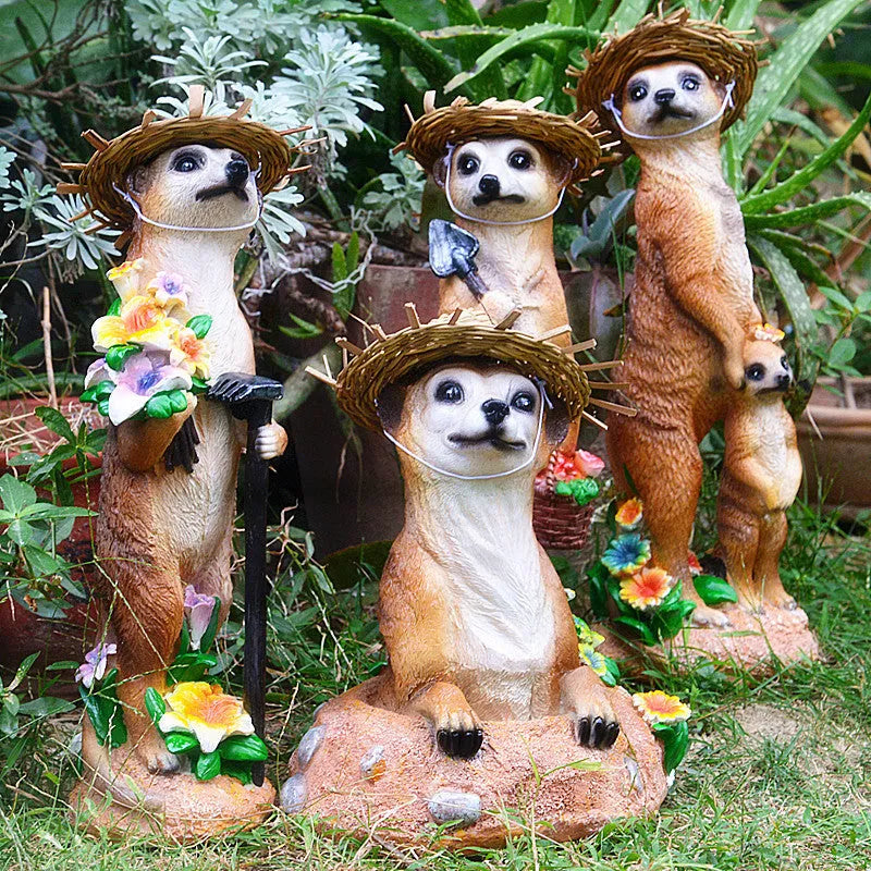 Straw hat mongoose ornament in resin and plastic with detailed animal features and miniature tools