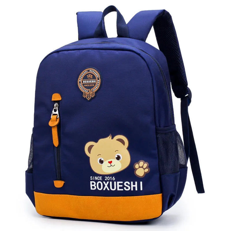 Cartoon bear schoolbag for nursery school children in deep blue and mei red colour options.