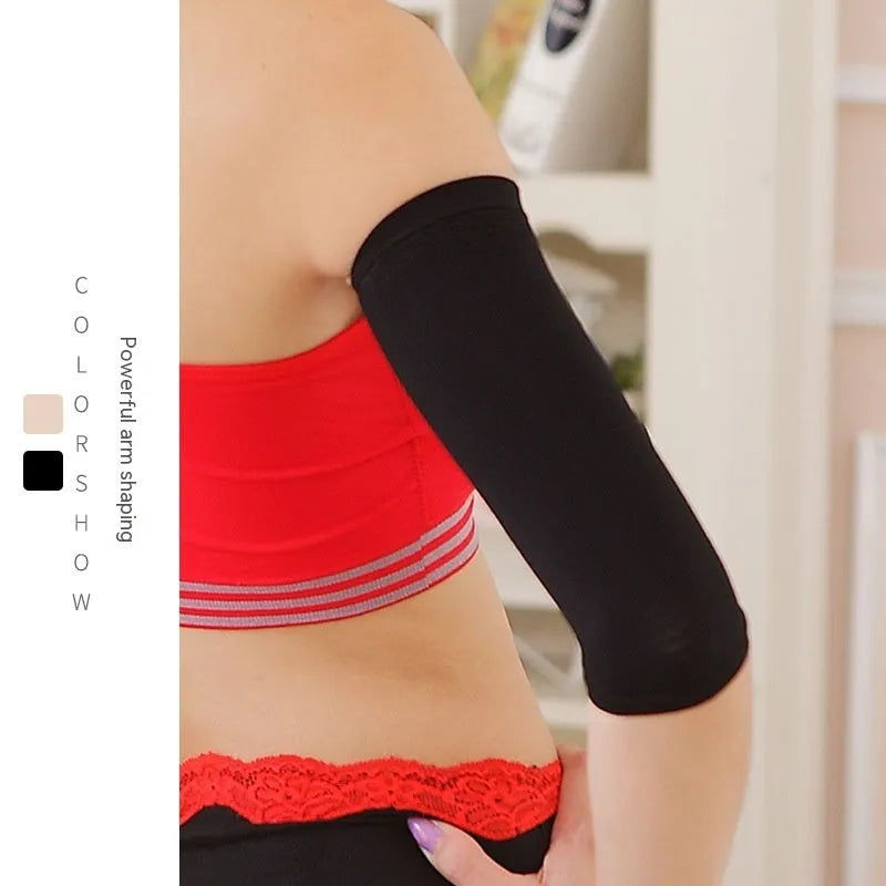Women's black nylon compression arm sleeves showing free size design