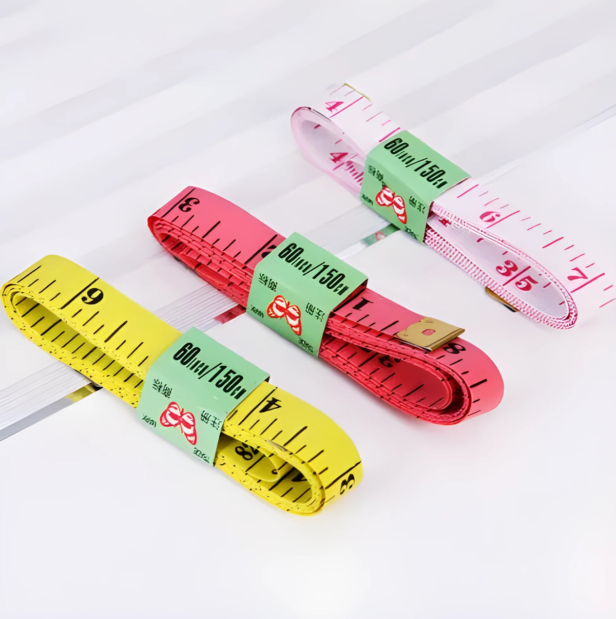 Flexible fibreglass sewing ruler, 150 cm / 60 inches, centimetres and inches, metal tips, multicolour, 4 pack