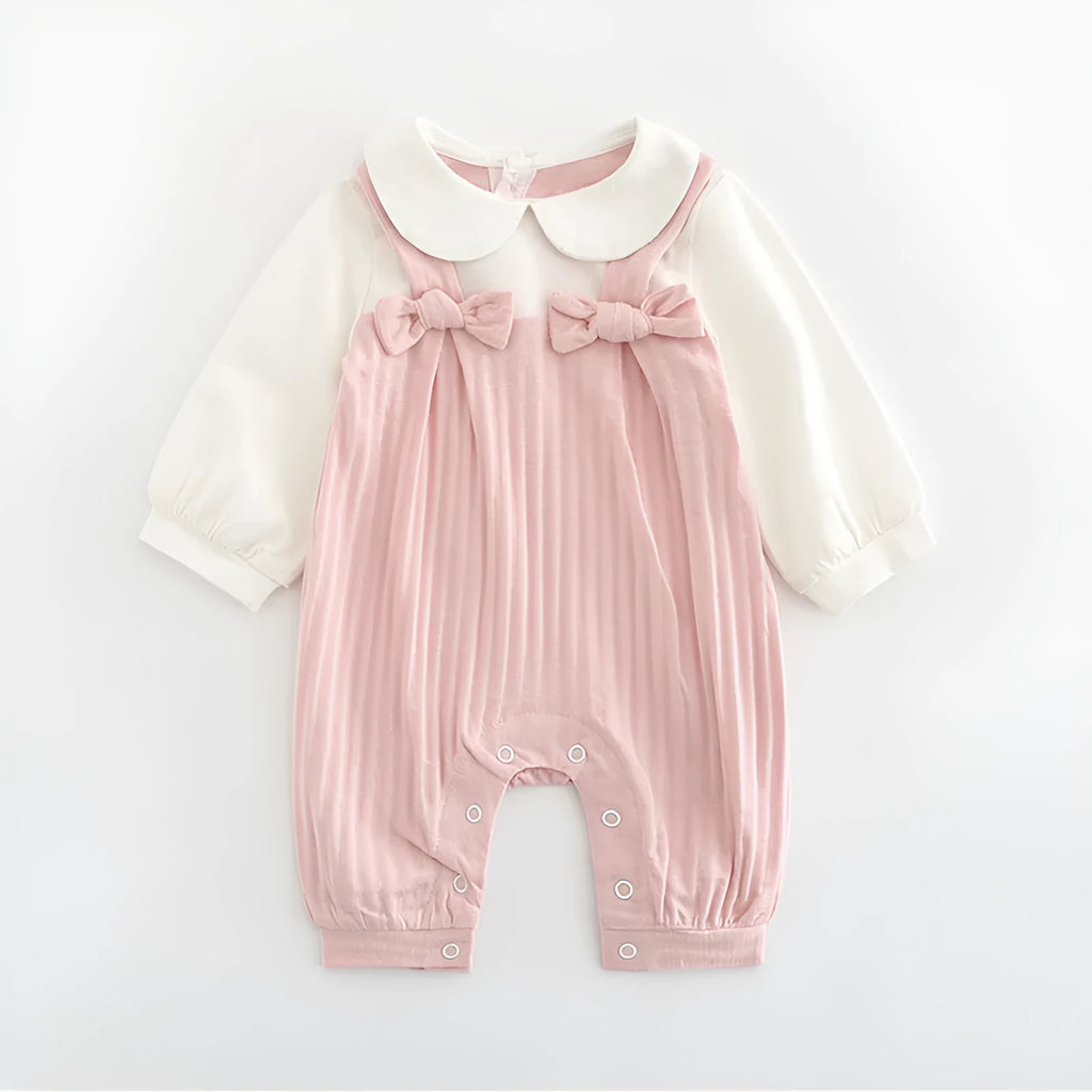 Pink embroidered cotton jumpsuit for baby girl with long sleeves and single-breasted closure