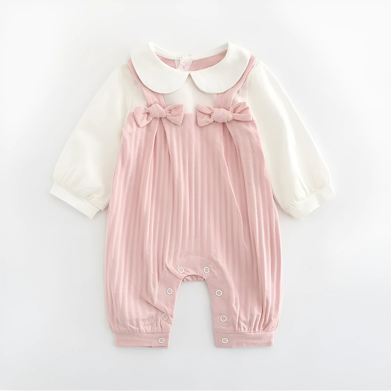 Pink embroidered cotton jumpsuit for baby girl with long sleeves and single-breasted closure
