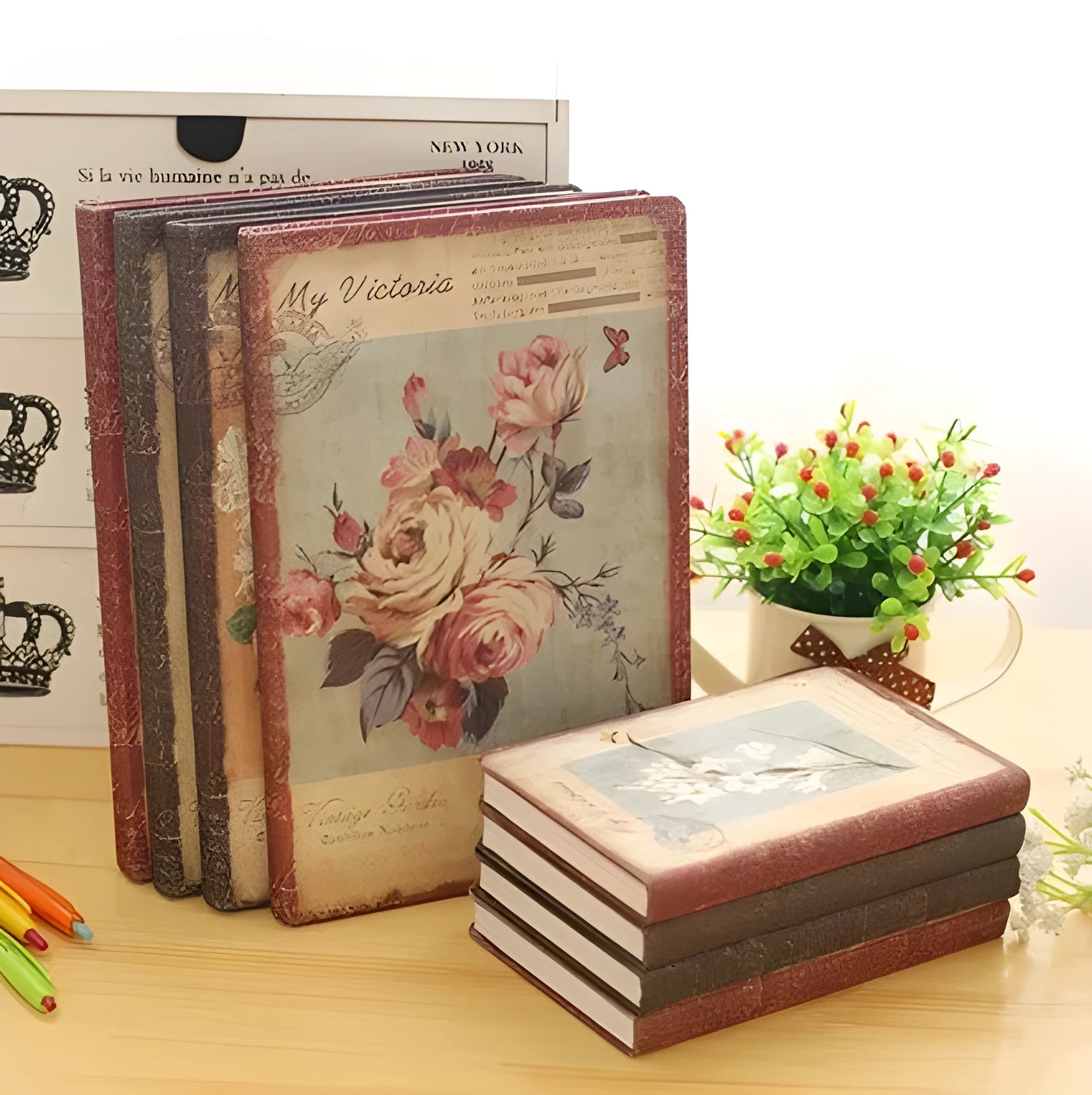 Hardcover notebook with cloth cover showing retro floral pattern in either lily, peony or white rose design