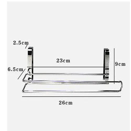 Silver stainless steel cabinet door back hanging paper towel rack on a kitchen cabinet.
