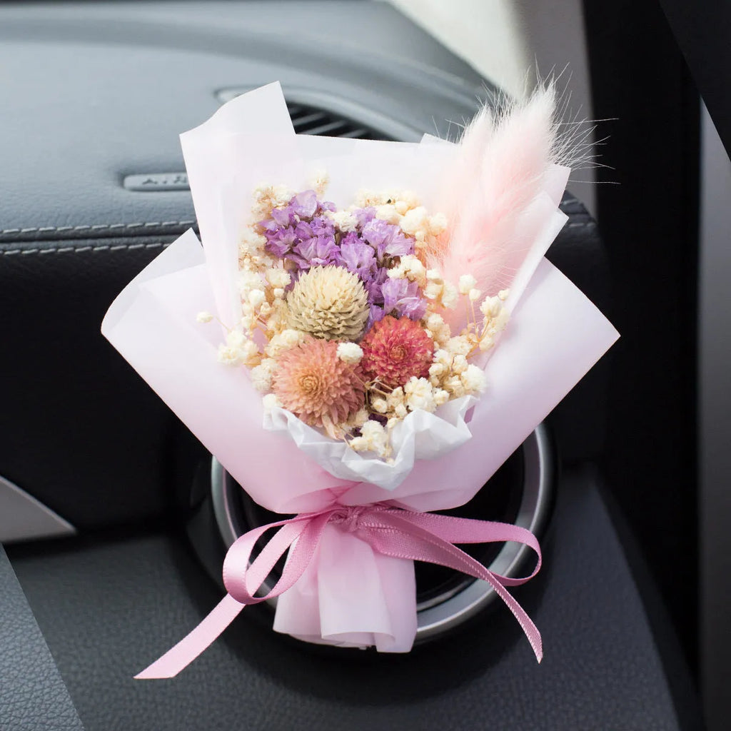 Car aromatherapy vent perfume with dried flower ornament measuring 10cm in various colours