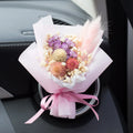 Car aromatherapy vent perfume with dried flower ornament measuring 10cm in various colours